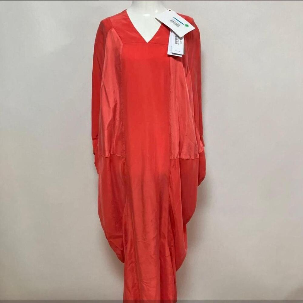 Orange kaftan which is slightly